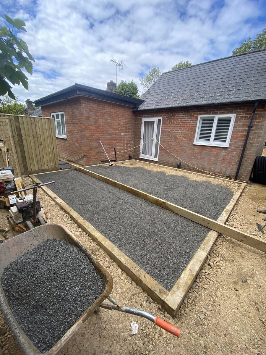 Driveway excavated and edged with a compacted stone sub-base going in